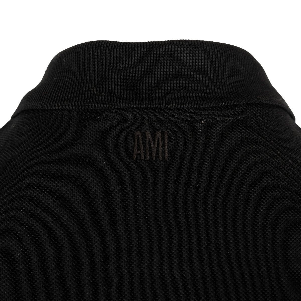 Load image into Gallery viewer, AMI Black/Red De Coeur Logo Polo

